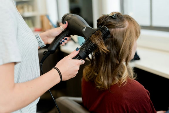 woman-in-red-long-sleeve-shirt-holding-hair-blower.jpg woman in red long sleeve shirt holding hair blower